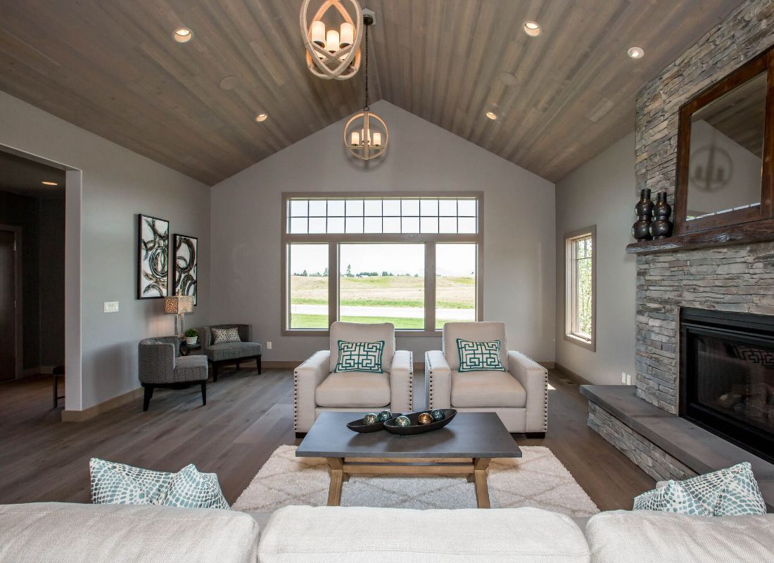 A living room with couches and tables in it